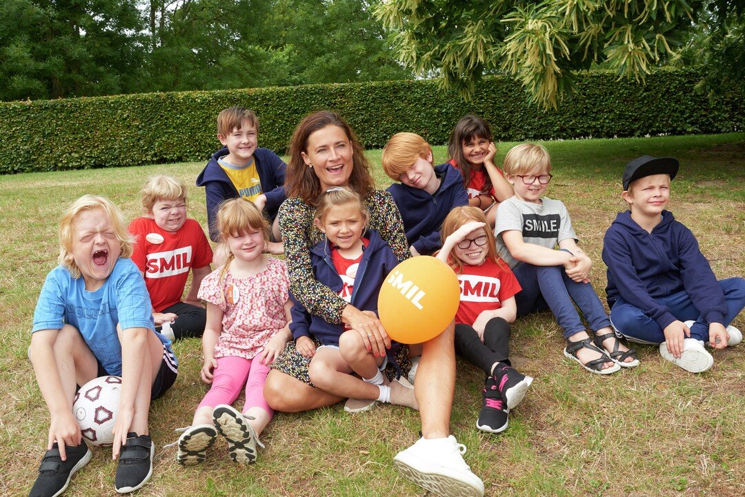 A group picture of children and an adult